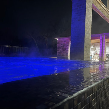 Polymer vinyl liner pool w/concrete spillover spa & automatic pool cover