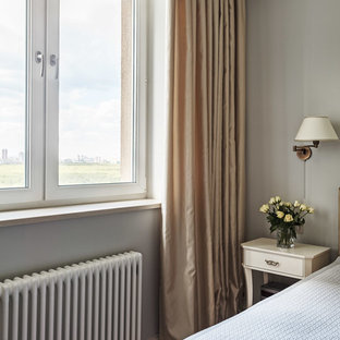 Design ideas for a small transitional master bedroom in Moscow with grey walls, laminate floors, no fireplace and beige floor.