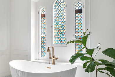 Bathroom - mid-sized traditional master white tile and ceramic tile marble floor, white floor, single-sink and tray ceiling bathroom idea in Chicago with flat-panel cabinets, dark wood cabinets, a two-piece toilet, white walls, an integrated sink, marble countertops, a hinged shower door, white countertops, a niche and a built-in vanity