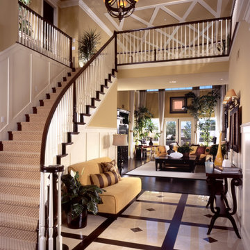 Classic Curved Wooden Staircase with a Straight Balcony