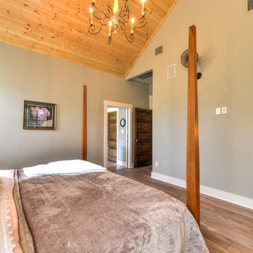 Beautiful Chandelier shines in this master suite