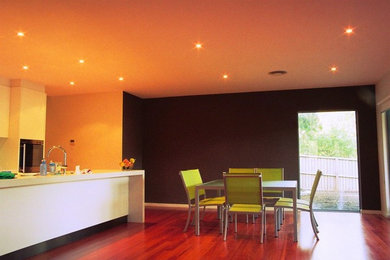 Design ideas for a contemporary kitchen/dining combo in Adelaide with multi-coloured walls.