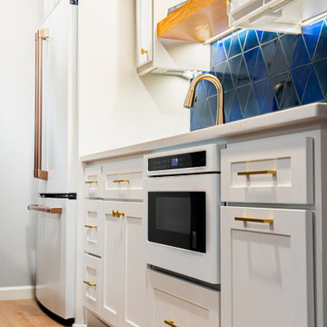 Bold Basement Finish — Linear Gas Fireplace, Wet Bar & Cafe Appliance Suite