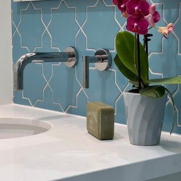 A Wall Mounted Faucet is Key to Maximizing Counter Space for a Compact Vanity