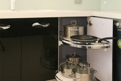 Mid-sized single-wall eat-in kitchen photo in Other with a double-bowl sink, open cabinets, dark wood cabinets, wood countertops, gray backsplash, ceramic backsplash, colored appliances and an island