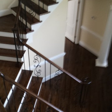 White Oak Hardwood Floors, Stairs and Iron post and Balusters