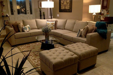 Inspiration for a mid-sized transitional open concept marble floor family room remodel in Los Angeles with beige walls, a standard fireplace, a stone fireplace and a media wall