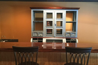 Basement - transitional basement idea in Other