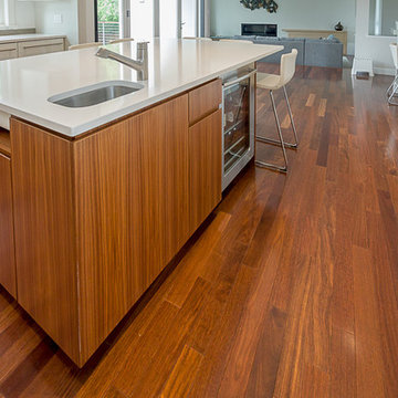 Rift cut Walnut veneer island in a contemporary kitchen