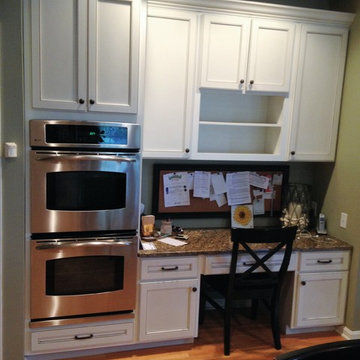 White cabinets with a coffee glaze.