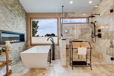 Bathroom - mediterranean master beige tile and travertine tile porcelain tile and beige floor bathroom idea in Denver with shaker cabinets, white cabinets, beige walls, an undermount sink, quartz countertops, a hinged shower door and black countertops