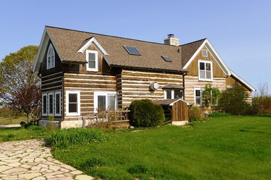 Rustic exterior home idea in Other