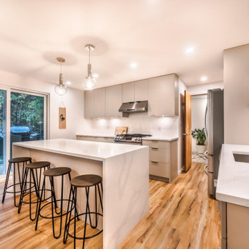 Tidal Sand Flat door kitchen cabinets with quartz countertops