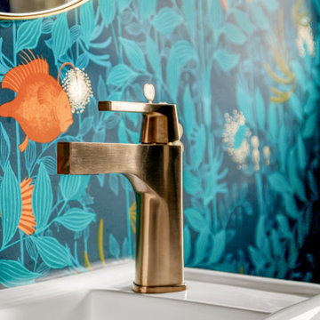 Brass Faucet with Botanical Backdrop