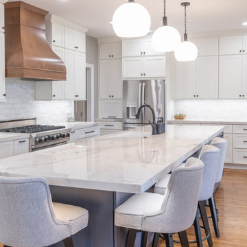 Porcelain Island Kitchen Remodel with Custom Built-Ins + Fireplace Feature