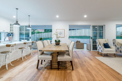 Design ideas for a transitional dining room in Brisbane.