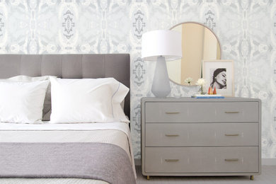 Example of a minimalist carpeted and gray floor bedroom design in New York