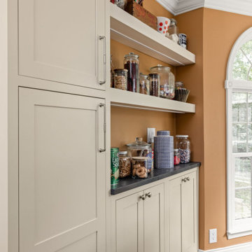 Warm Traditional Kitchen Remodel with Cream Cabinets & Herringbone Floors
