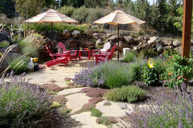 Tuscan backyard decomposed granite patio photo in Other
