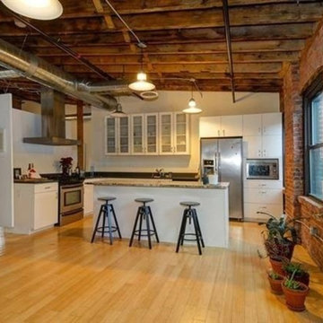 High gloss European frameless loft kitchen in Newark, NJ