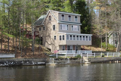 Home design - large transitional home design idea in Portland Maine