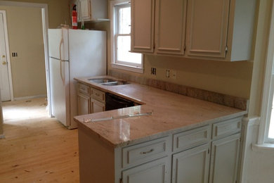 Example of a transitional kitchen design in Charleston