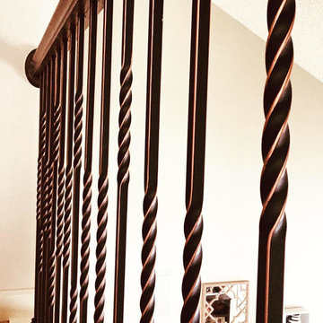 Staircases and Railings with Oil Rubbed Copper Wrought Iron Balusters