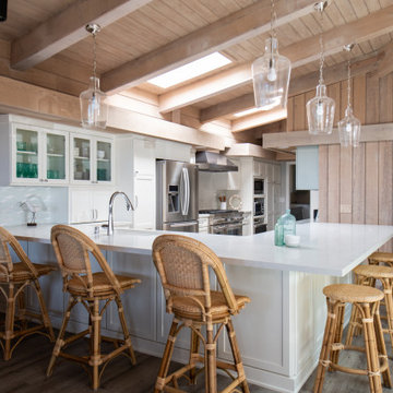 Spacious Beach Home Kitchen Remodel with Bar Seating