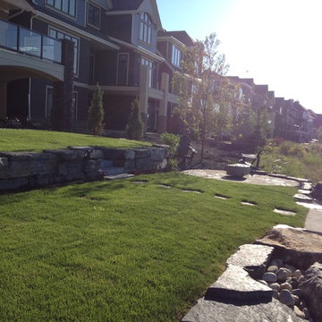 Circular Patio and Boulder Wall