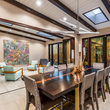 Interior Bi-Fold Doors Separate Formal Sitting Room from Dining Room