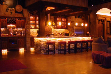 Example of a tuscan home design design in Dallas