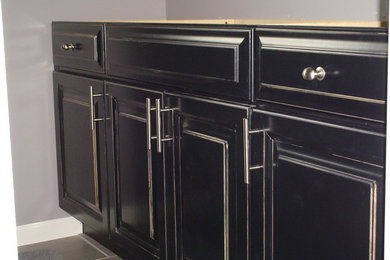 Bathroom - small contemporary master bathroom idea in Kansas City with black cabinets