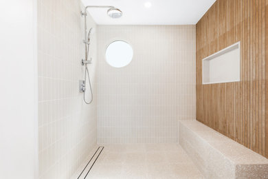 Inspiration for a mid-sized mid-century modern master ceramic tile terrazzo floor and single-sink bathroom remodel in Los Angeles with brown cabinets, a one-piece toilet, an undermount sink, quartz countertops, gray countertops and a freestanding vanity