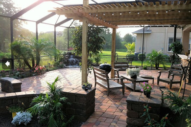This is an example of a tropical patio in Tampa.