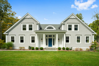 Home design - large coastal home design idea in Bridgeport
