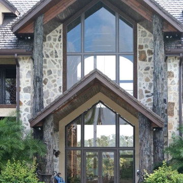Outdoor Cypress Trunks Clad Red Iron Columns