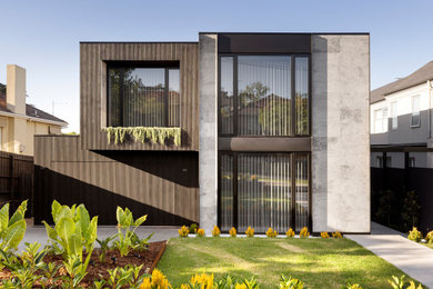Inspiration for a mid-sized contemporary two-storey exterior in Melbourne.