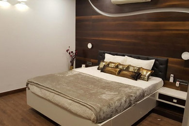 Inspiration for a contemporary bedroom remodel in Pune