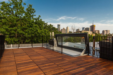 Mid-sized traditional rooftop deck in New York.