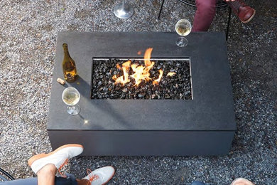 Mid-sized transitional gravel patio photo in San Francisco with a fire pit and no cover