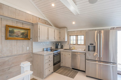 Example of a beach style kitchen design in New York