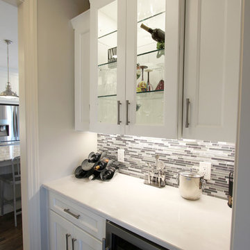 White Kitchen with Gray and Black Quartz Countertop and Bar Area ~ Streetsboro