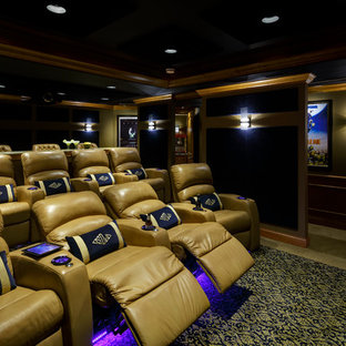 Inspiration for a small traditional enclosed home cinema in St Louis with beige walls, carpet and a projector screen.