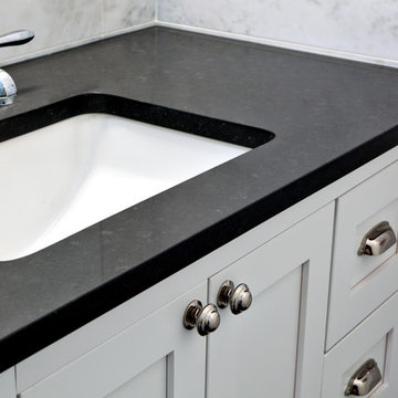 Stone top vanity featuring Chrome Accessories