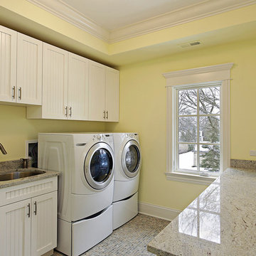 White Laundry Room Cabinets with Granite Countertop