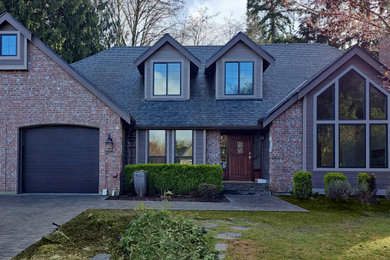 Inspiration for a modern two-story exterior home remodel in Seattle