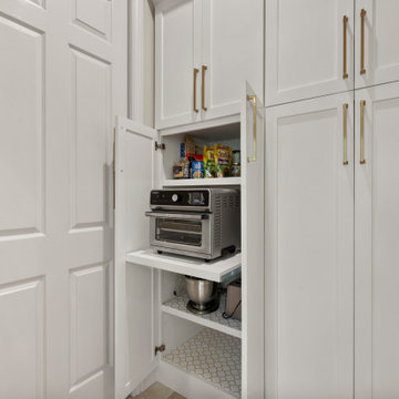 Walk-In Appliance Pantry with Pull-Out Appliance Shelf and White Storage Cabinet