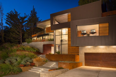 This is an example of an expansive contemporary three-storey exterior in San Francisco with mixed siding.