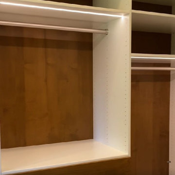 Modern Master Closet with Lighting and Drawers