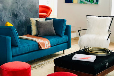Example of an eclectic formal and enclosed living room design in Boston with a media wall